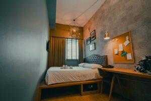 white bed linen on bed, Small Bedroom Organization Ideas