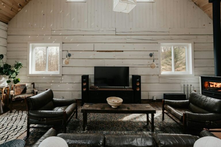 a living room filled with furniture and a fire place, Farmhouse Living Room Ideas