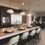 a kitchen with a marble counter top and a center island, Kitchen Island Ideas