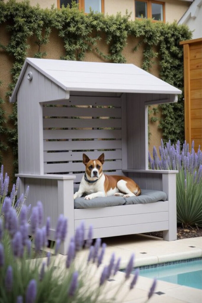 A black and tan dog relaxes inside a white canvas teepee on green grass, reflecting cozy and shaded Dog-Friendly Backyard Ideas for smaller yards.