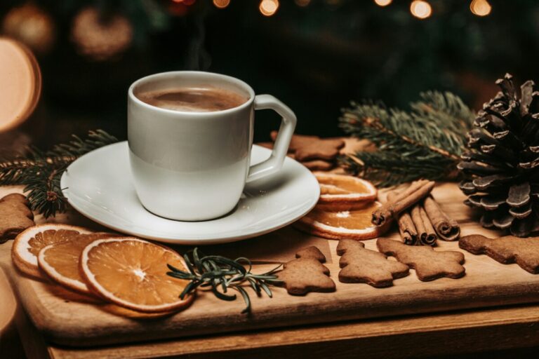 A cup of coffee sitting on top of a wooden table